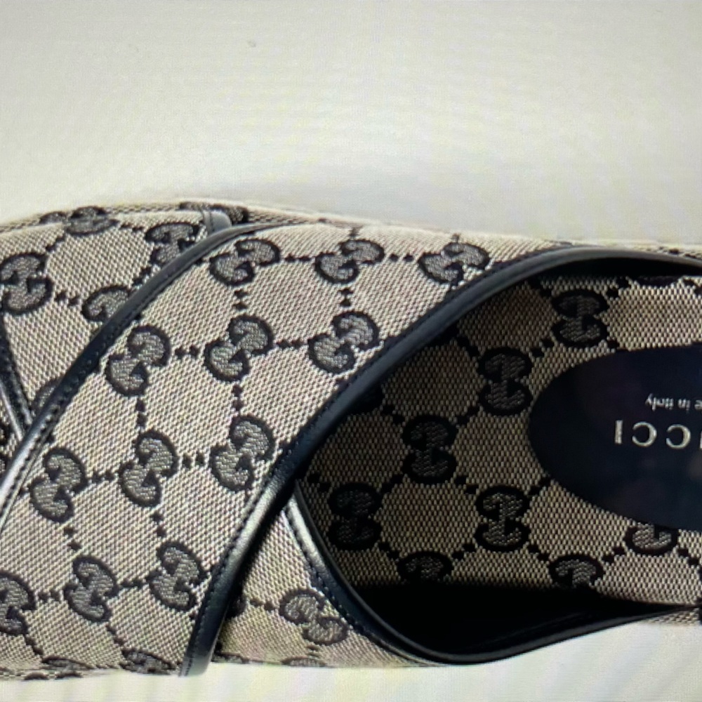 Brand new Gucci criss cross platform slides.